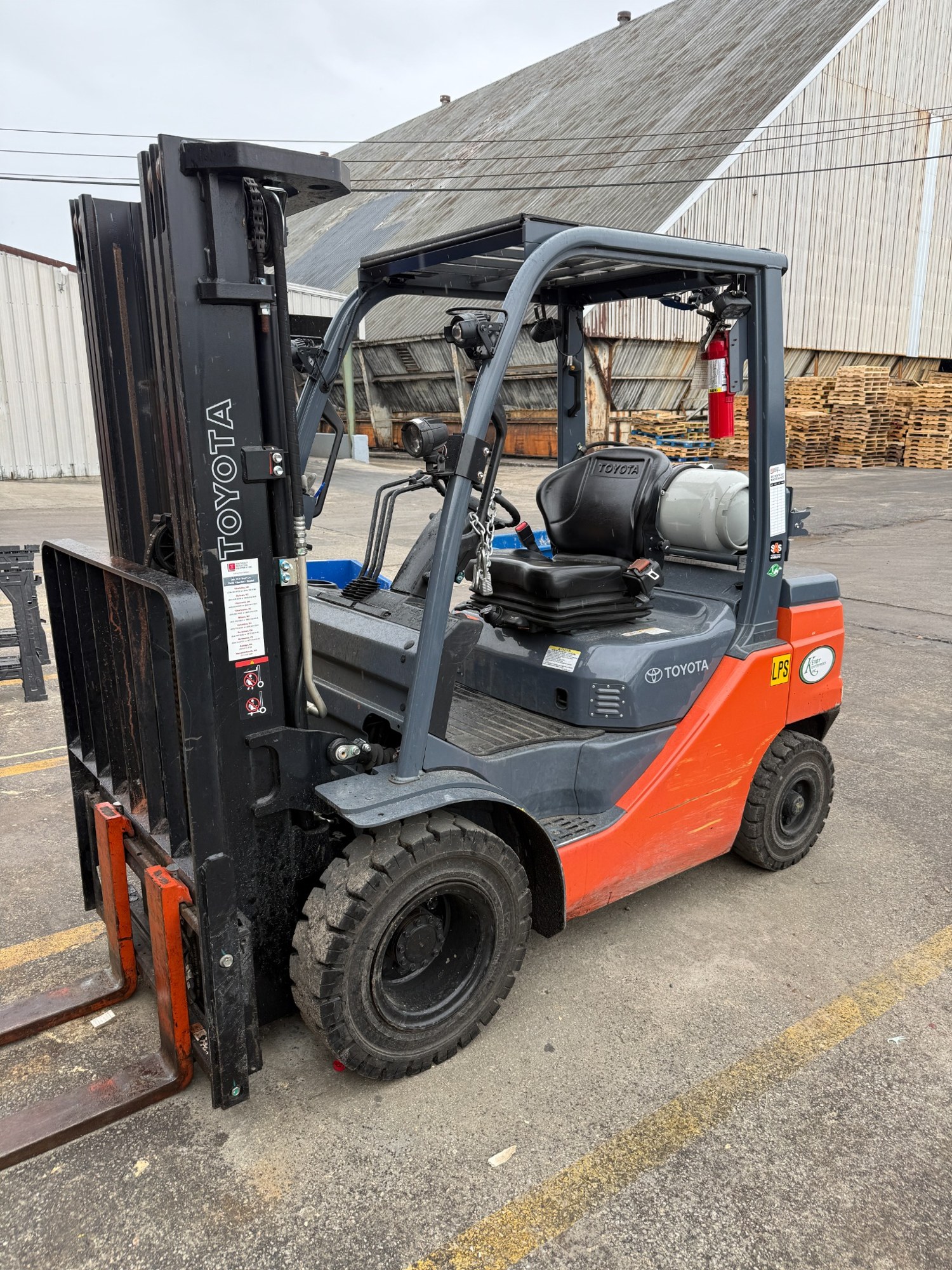 Orange and gray Toyota forklift with Kerby Enterprises branding